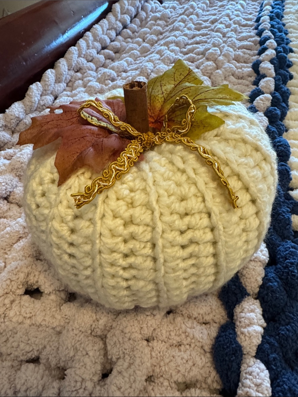 Handmade Cream Knit Pumpkin Decor with Autumn Leaves